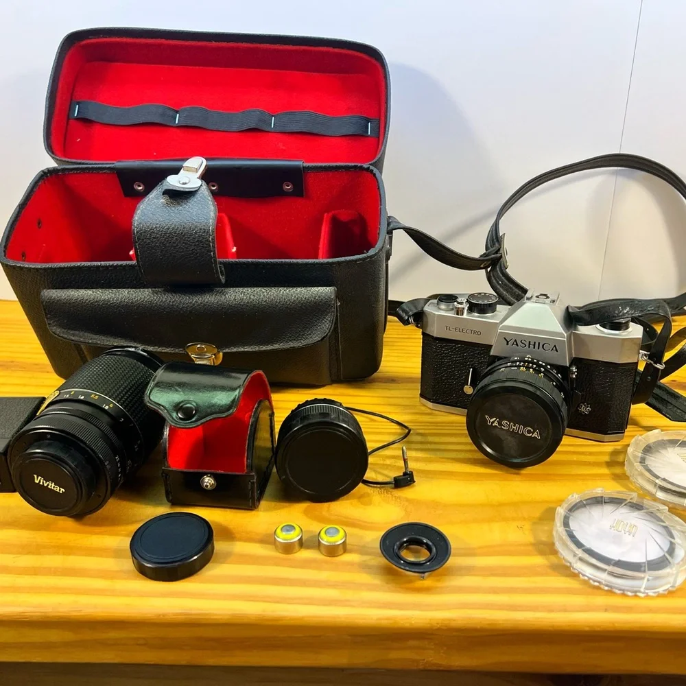 Yashica Black and Silver Film Camera with Rangefinder Design‎